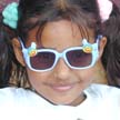 young girl wearing sunglasses in Honduras